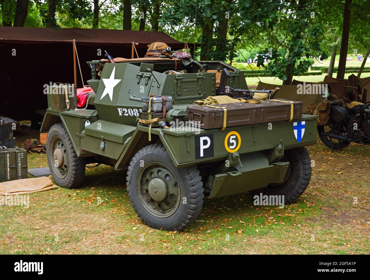 World War 2  Daimler Dingo Scout Car parked in trees. Stock Photo