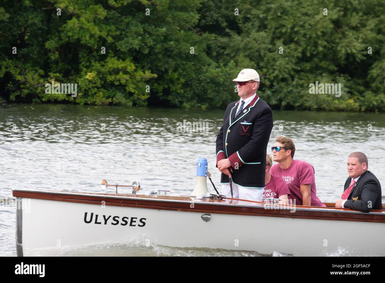 Sir Matthew Pinsent acts as the Umpire on the launch Ulysses at Henley Royal Regatta 2021 on the River Thames at Henley-on-Thames Stock Photo