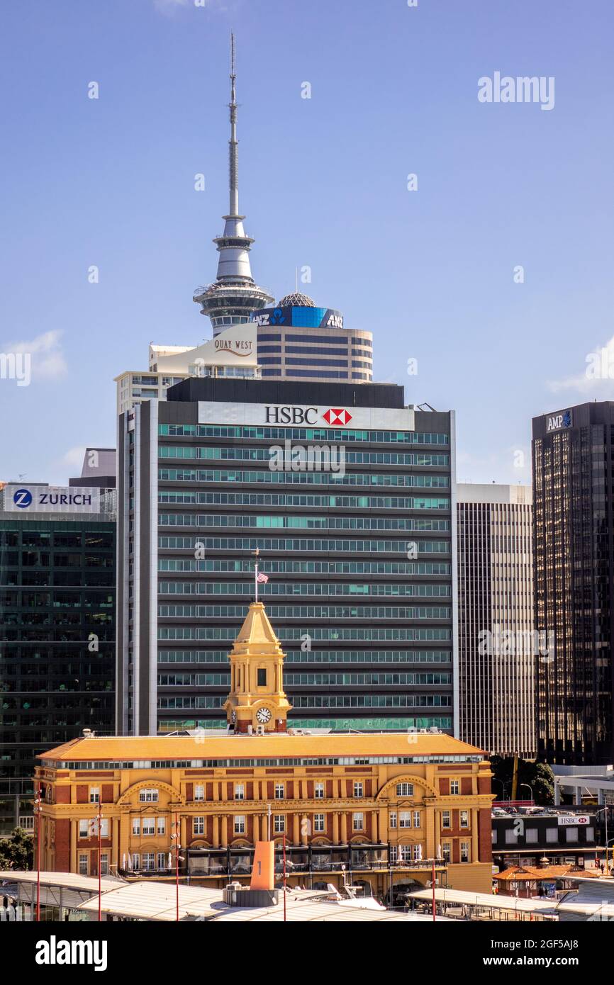 HSBC Bank Building And Historic Downtown Ferry Building In Auckland City Centre Sky Tower In The Background New Zealand Vertical Framing, Stock Photo