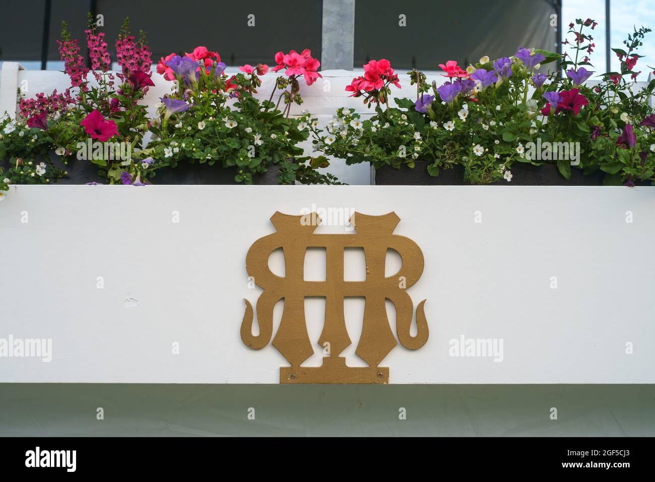 Decorative flower boxes on the main grandstand in the Stewards Enclosure at Henley Royal Regatta 2021 on the River Thames Stock Photo