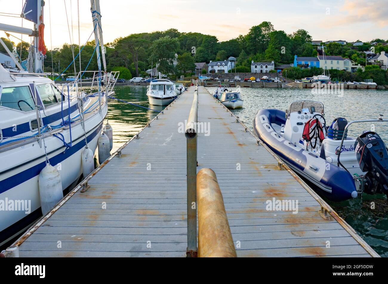 Boats moored to the pontoon at Hazelbeach, Milford Haven in Pembrokeshire, Wales. Stock Photo