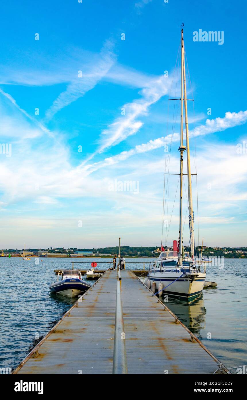 Boats moored to the pontoon at Hazelbeach, Milford Haven in Pembrokeshire, Wales. Stock Photo
