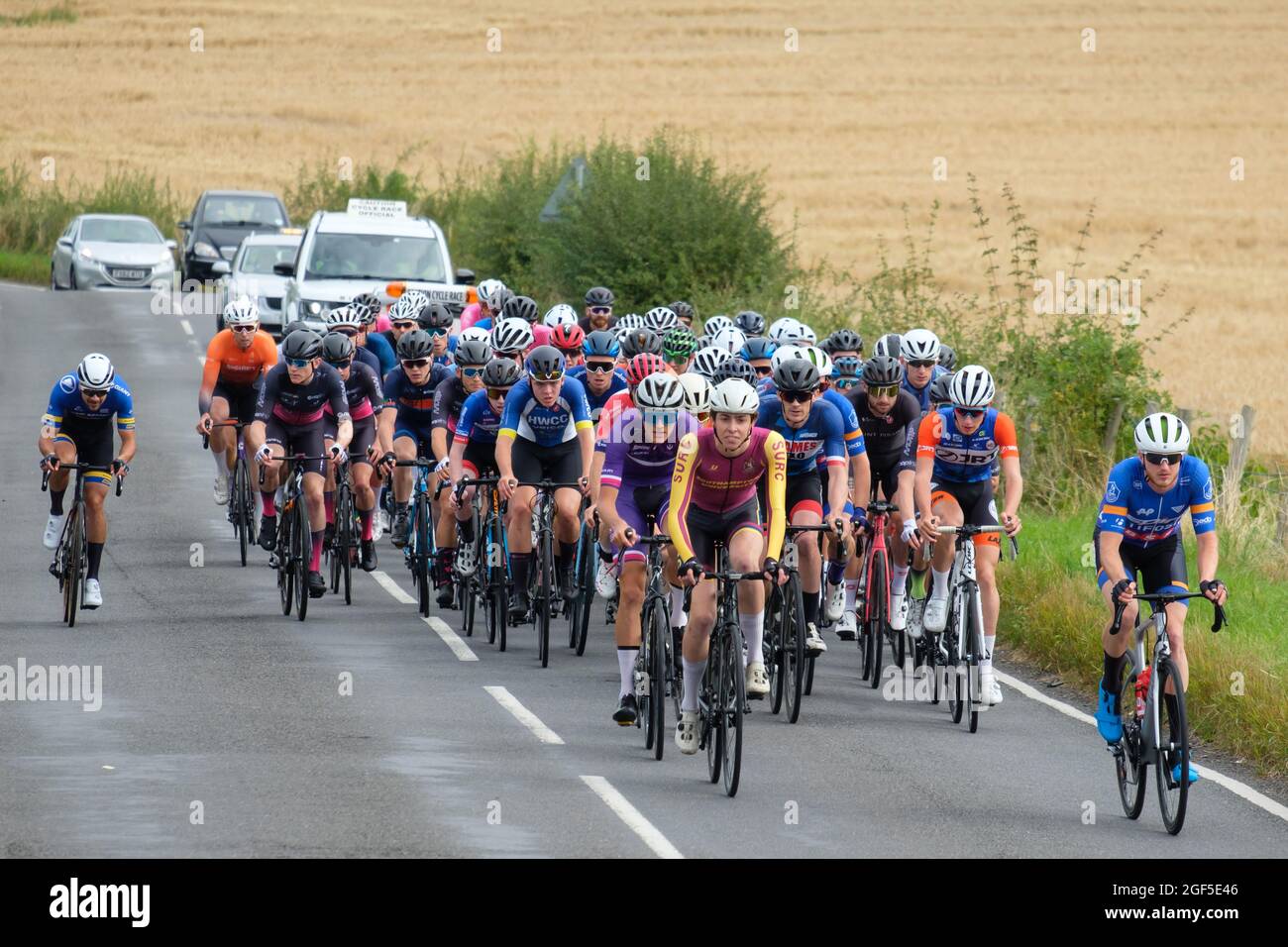Cyclists taking part in the 2021 Victor Berlemont Trophy road race around Woodcote in Oxfordshire Stock Photo