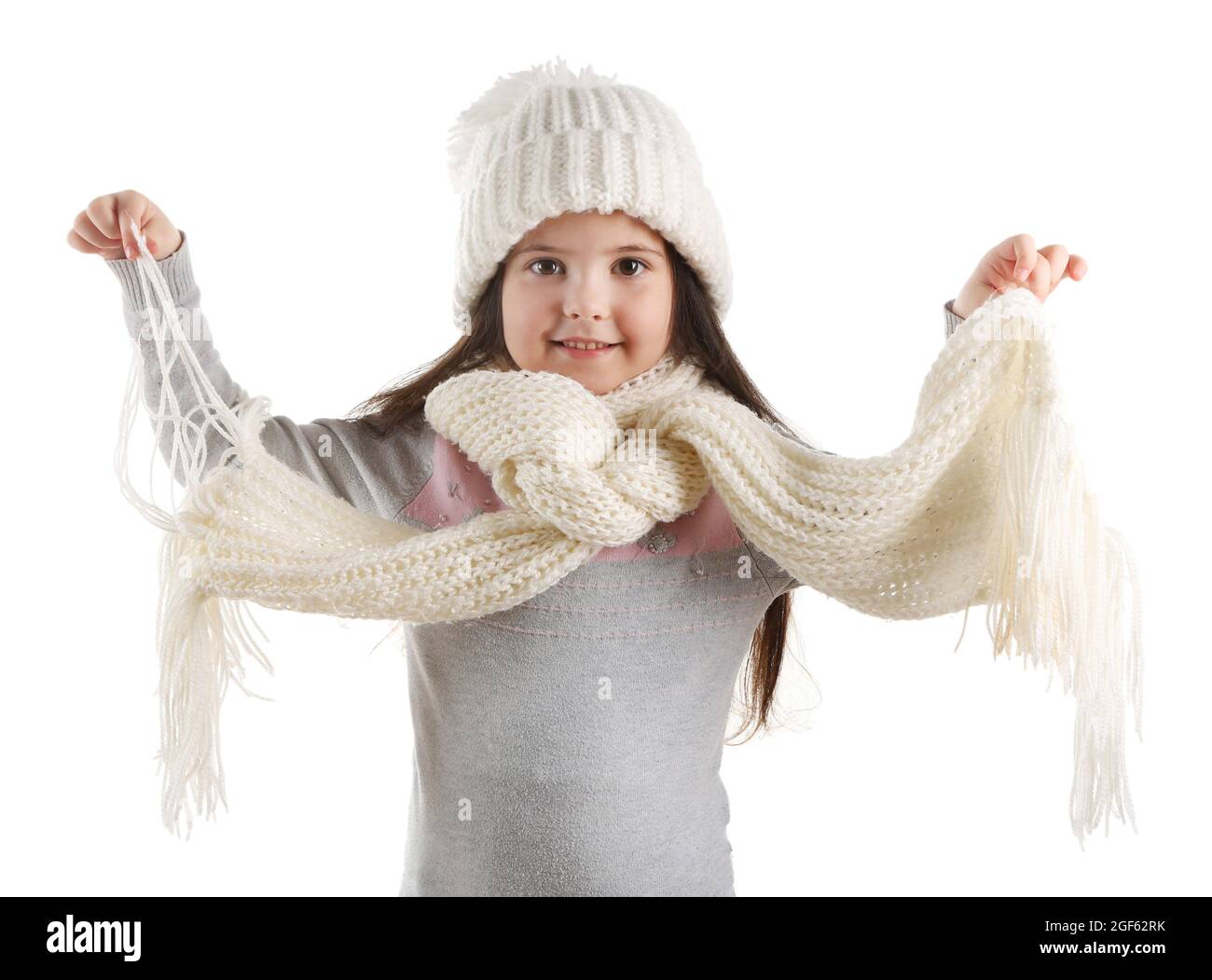 Little girl in a trendy knitted clothes, isolated on white Stock Photo