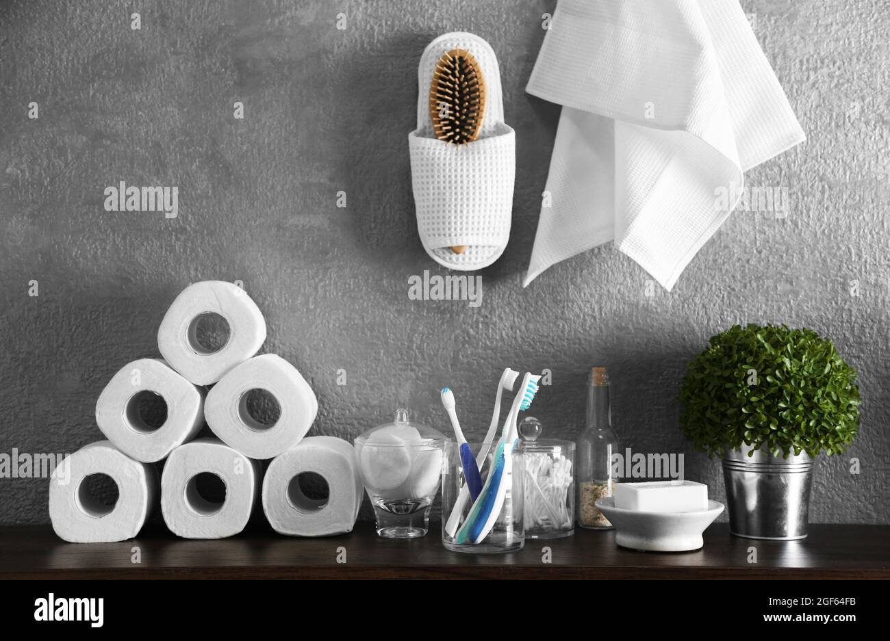 Bath accessories on grey wall background Stock Photo - Alamy
