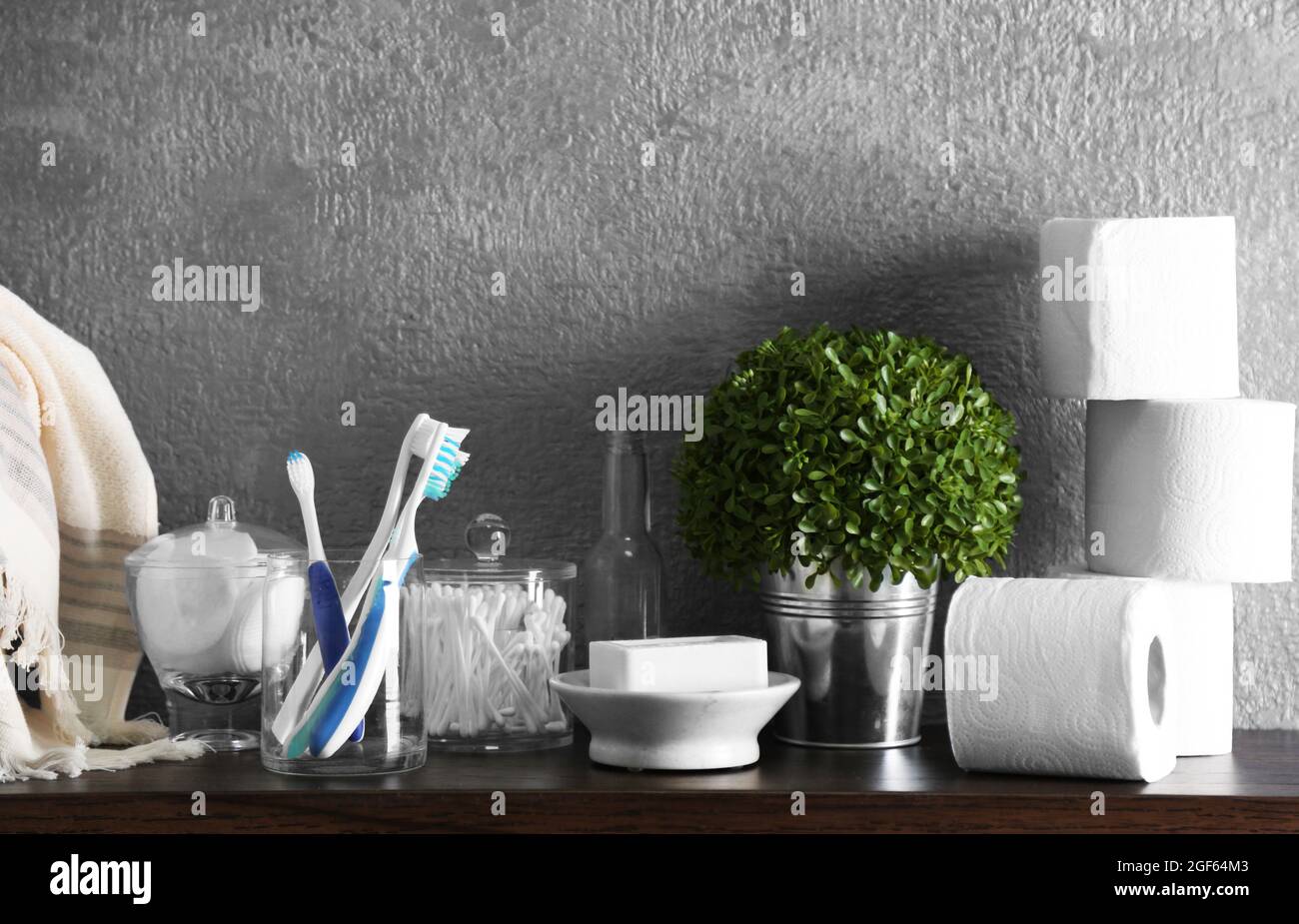 Bath accessories on grey wall background Stock Photo - Alamy