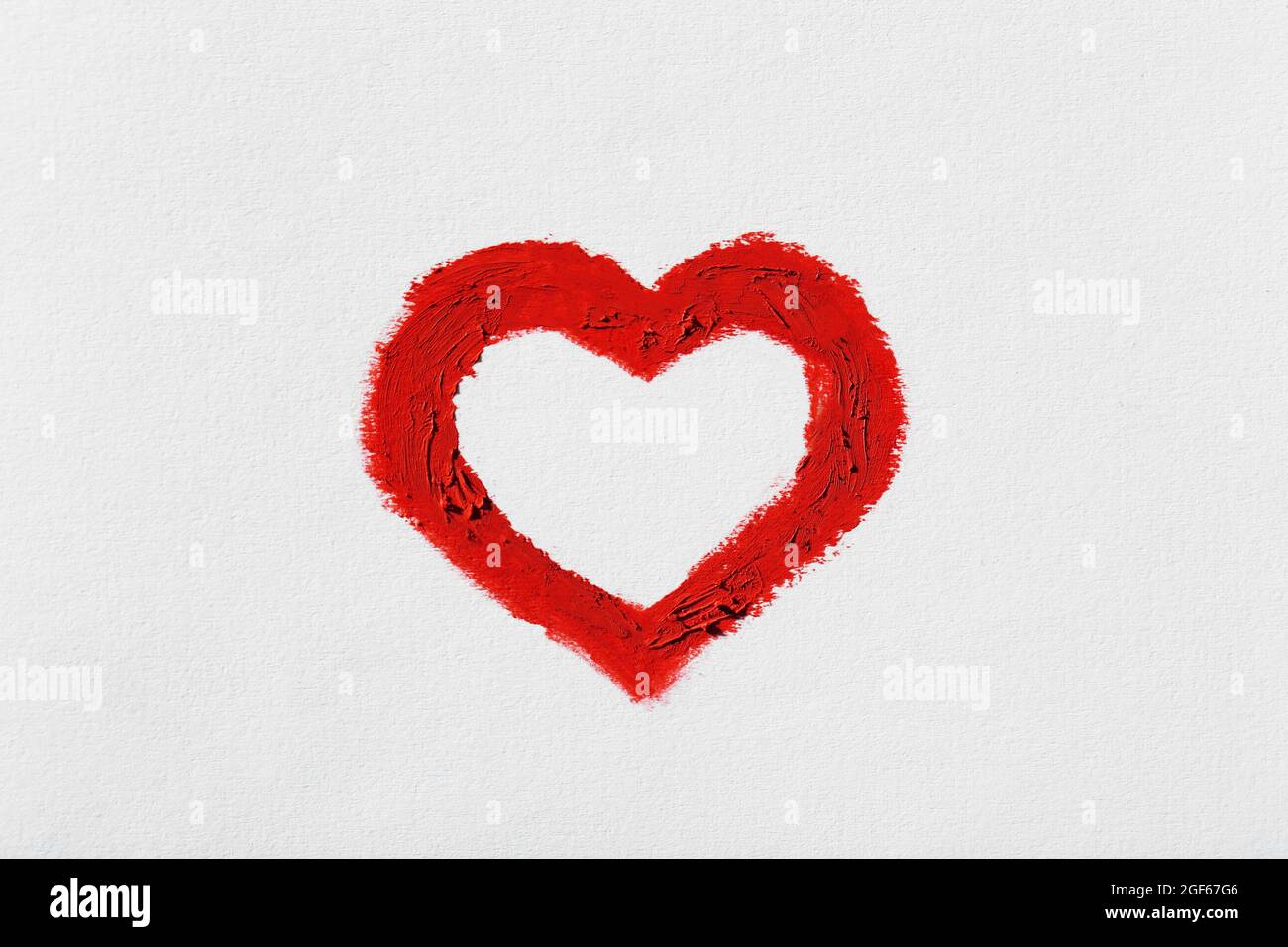 Red heart painted on light background Stock Photo - Alamy