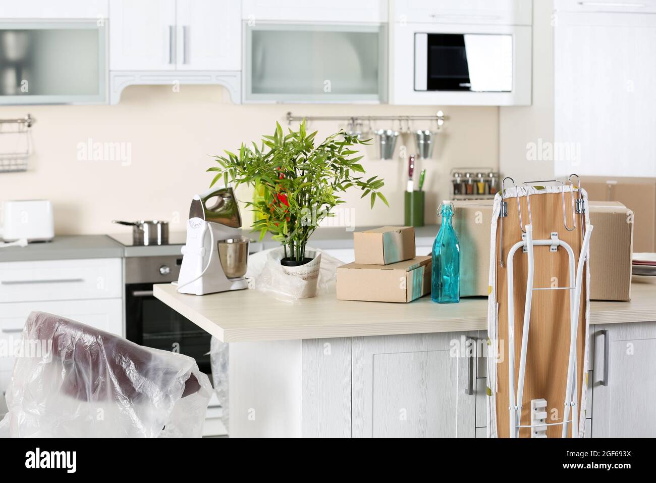 Packed household goods for moving into new house Stock Photo Alamy