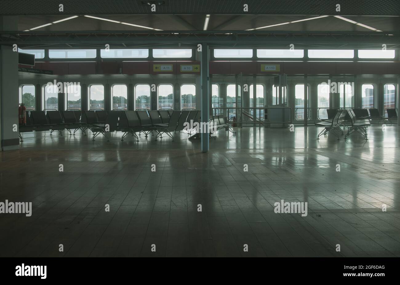 Berlin, Germany. 20th Aug, 2021. The waiting areas at the former Tegel Airport are empty. In the coming years, residential, research and commercial buildings will be built on the site of the disused airport. Credit: Paul Zinken/dpa-Zentralbild/ZB/dpa/Alamy Live News Stock Photo