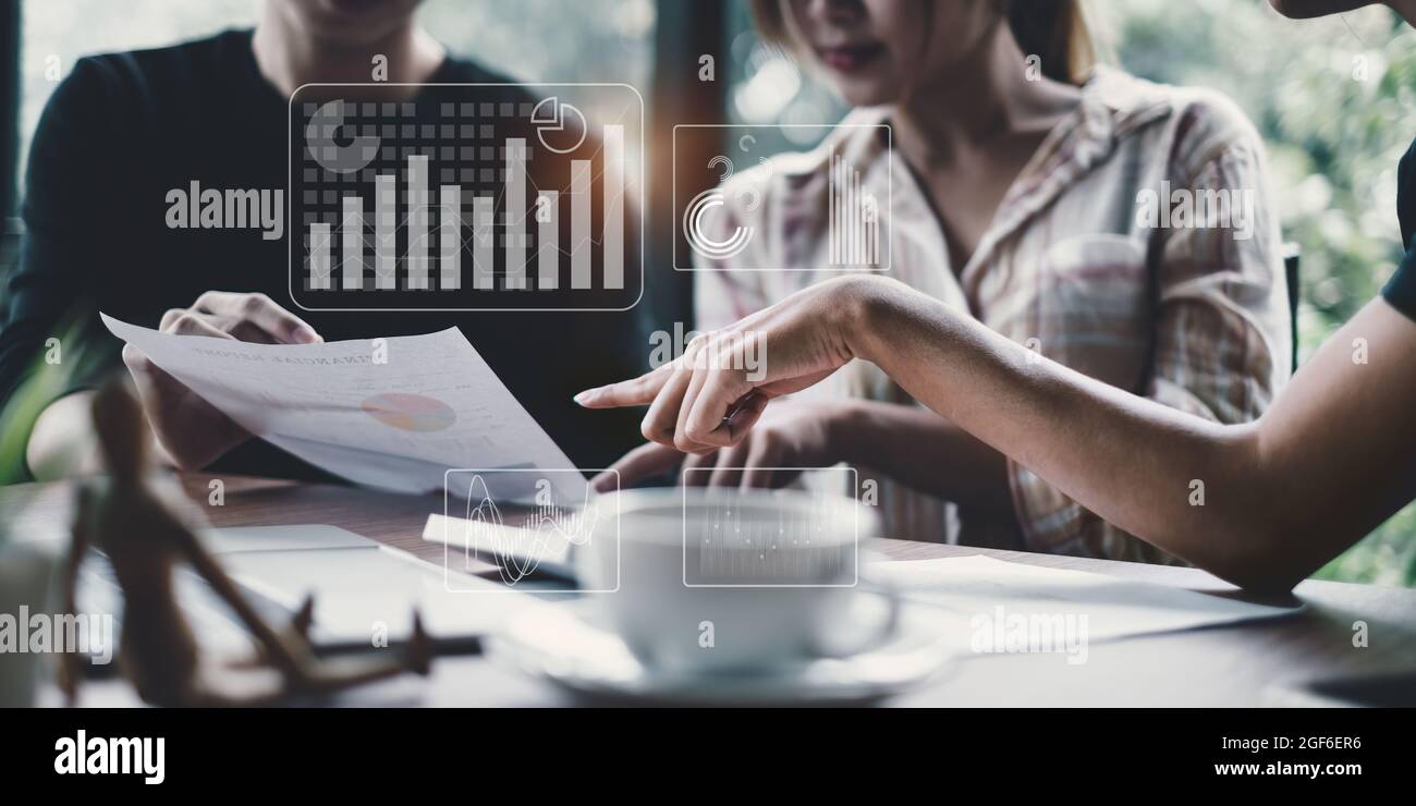 Fund Investor team analyzing stock market report making audit financial dashboard with business intelligence BI. Fintech concept.. Stock Photo