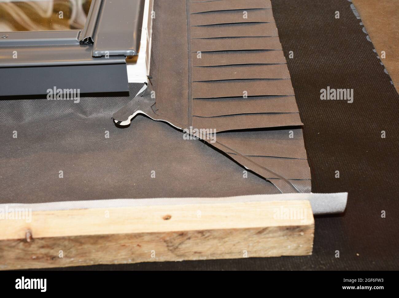Skylight window waterproofing installation details on house rooftop