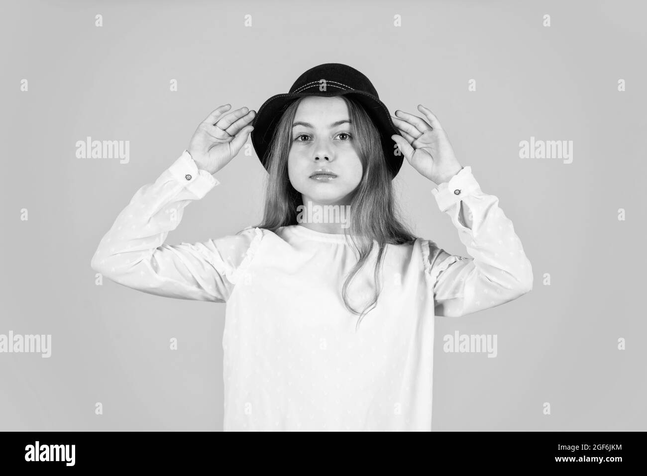 Child long hair wear hat. Accessories shop. Outfit inspiration. Panama