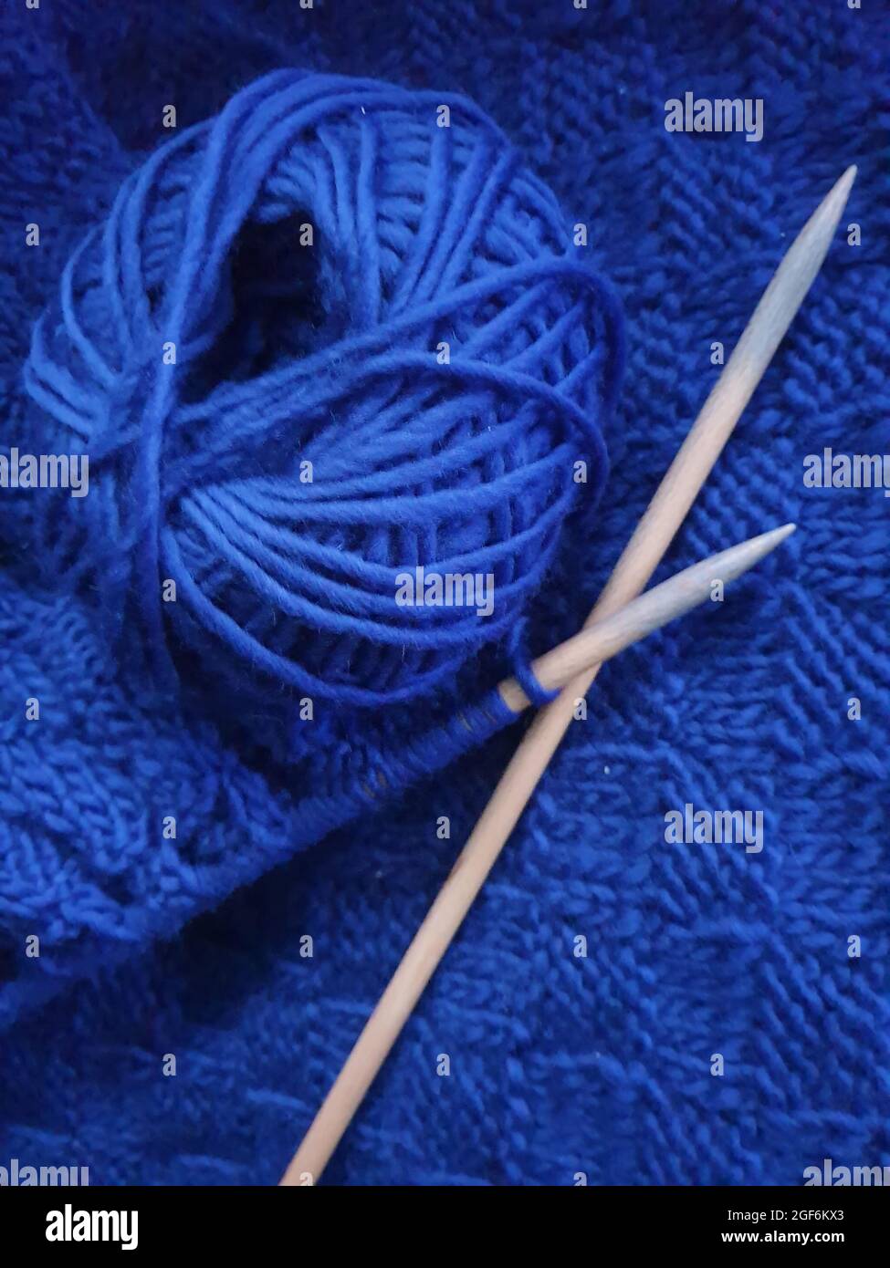 Knitting a blanket Stock Photo