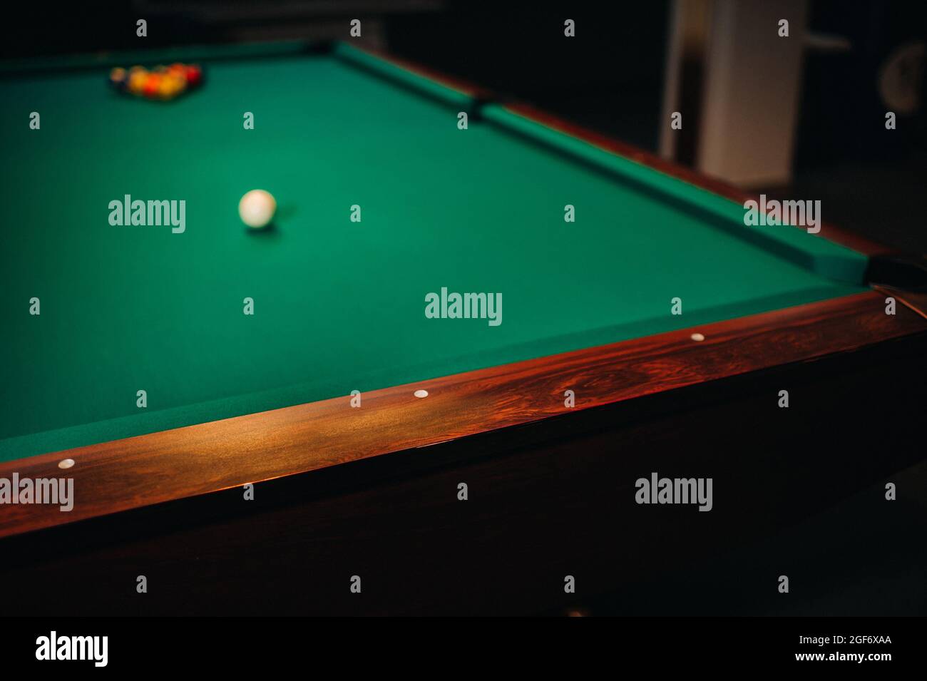 decorative billiard hole and green table with balls in the billiard club Stock Photo Alamy