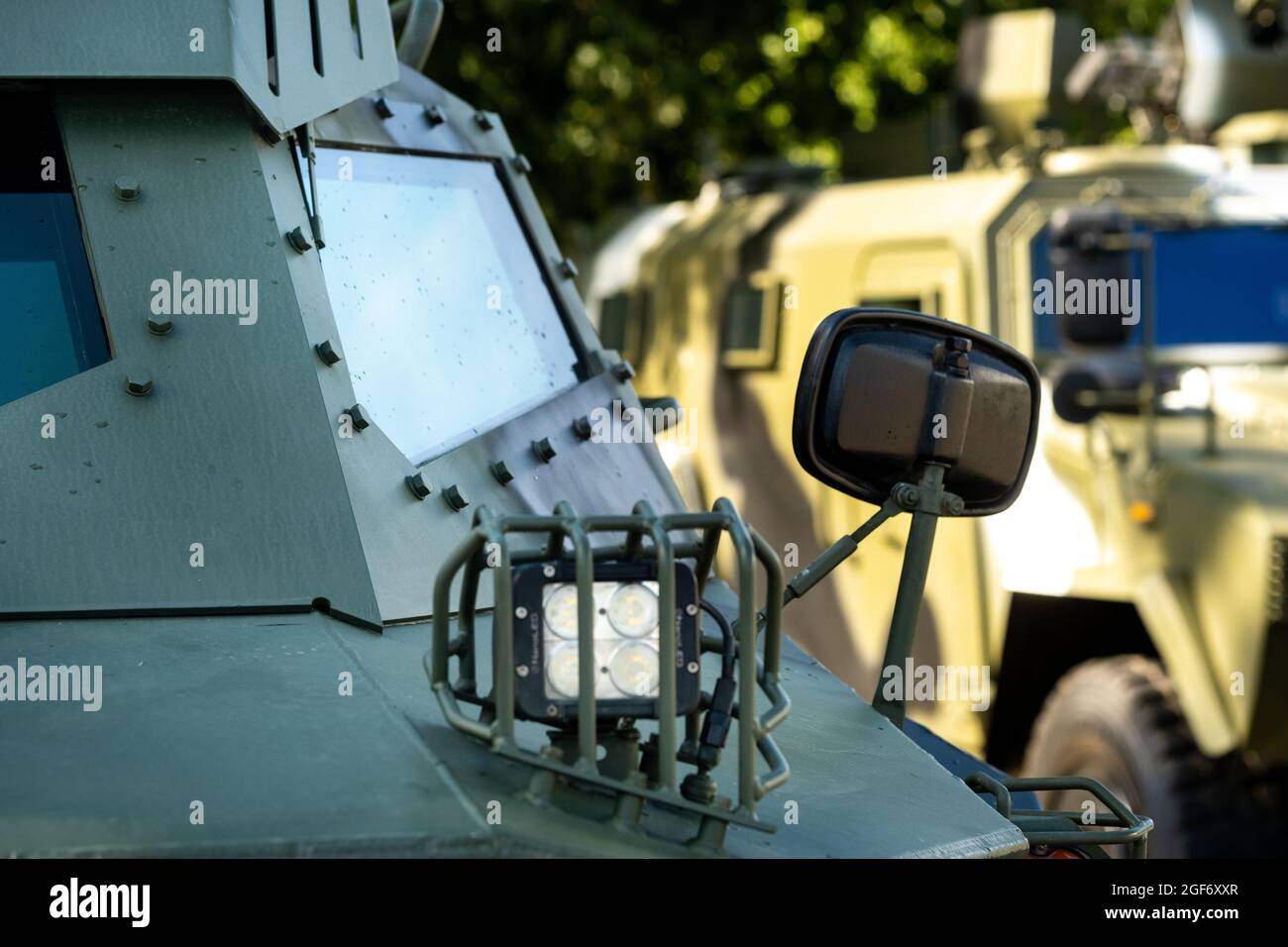 Military armored SUV of green color.Military concept Stock Photo Alamy