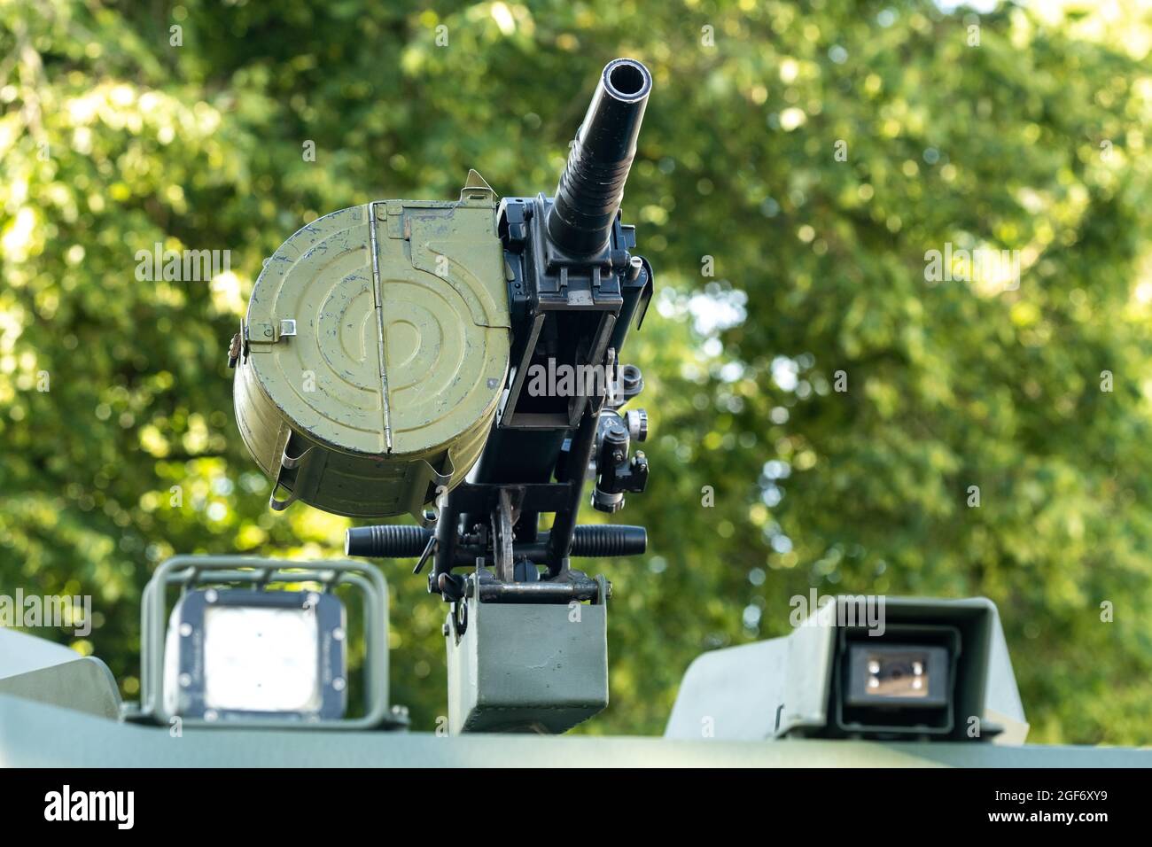 A grenade launcher standing in combat readiness on an infantry fighting vehicle.Military concept Stock Photo