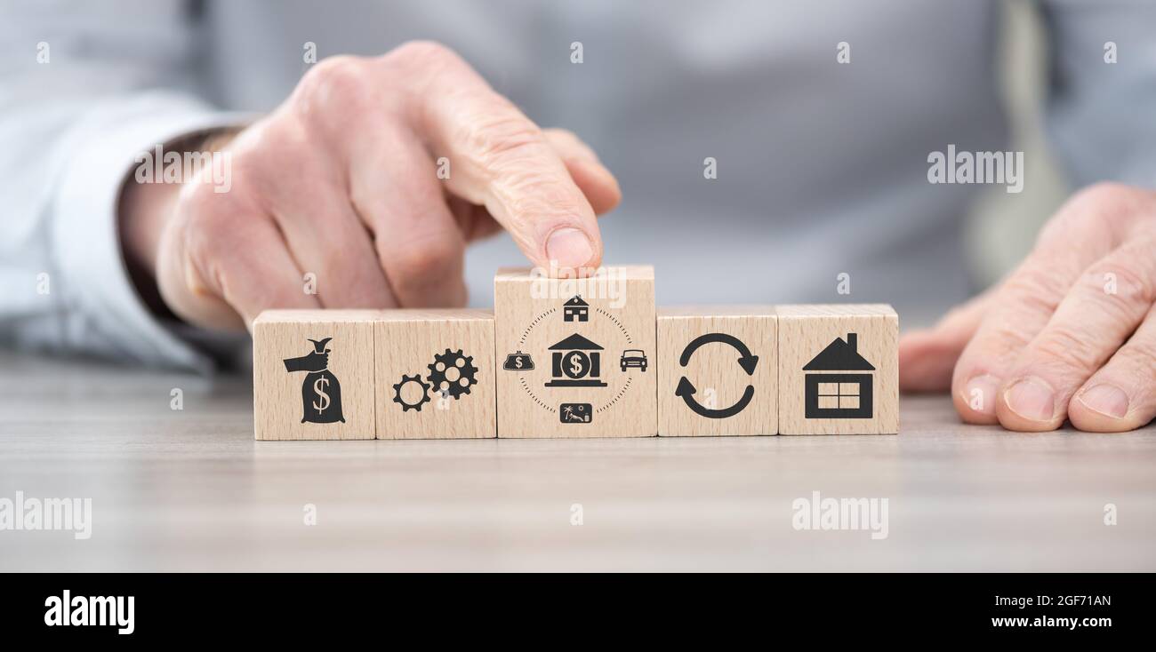 Wooden blocks with symbol of personal loan concept Stock Photo