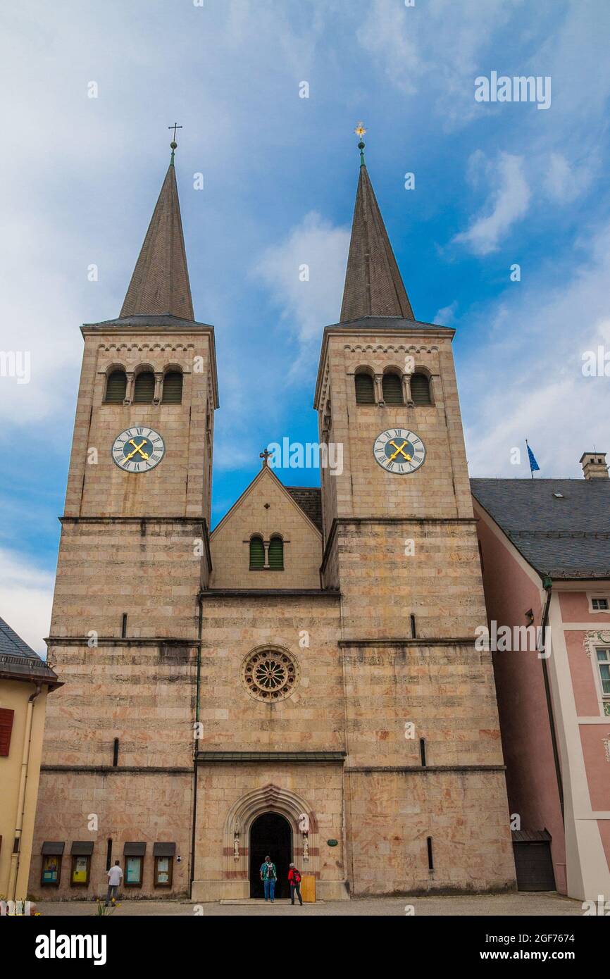 Lovely view of the collegiate church of St. Peter and John the Baptist which is part of the building ensemble of the Royal Castle in Berchtesgaden,... Stock Photo