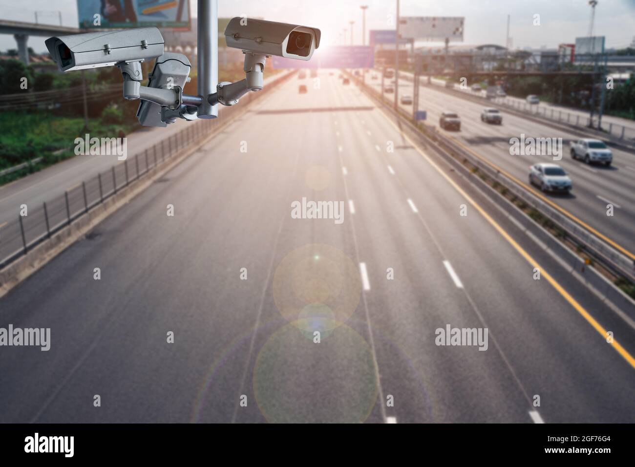 CCTV cameras on the overpass for recording on the road for safety and traffic violations. Stock Photo