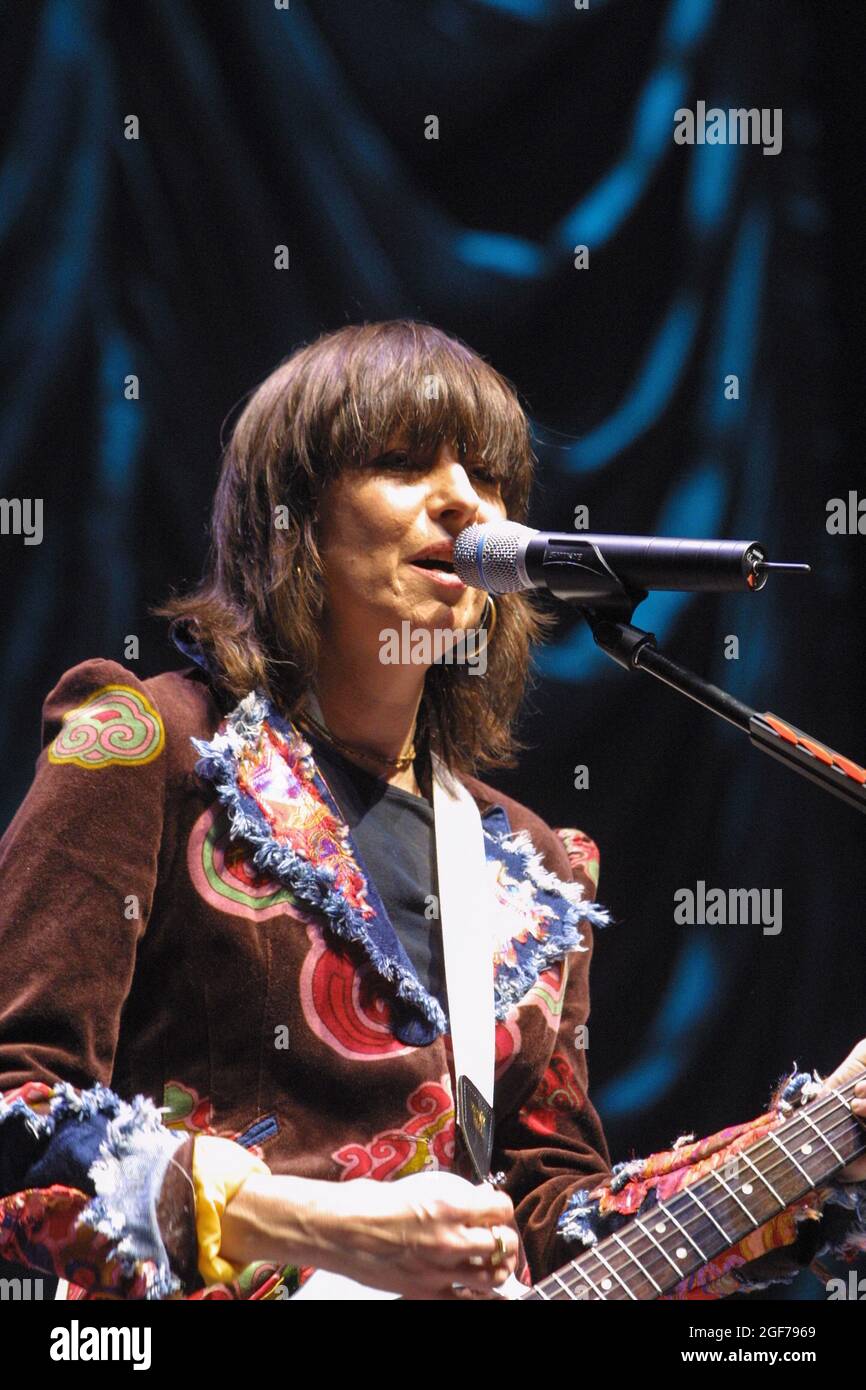 Chrissie Hynde, lead singer of The Pretenders, singing in concert at