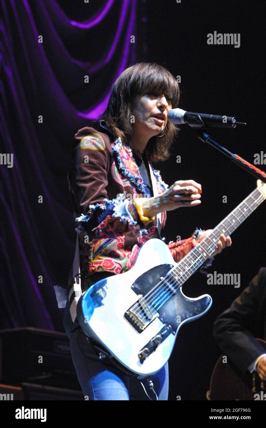 Chrissie Hynde, lead singer of The Pretenders, singing in concert at