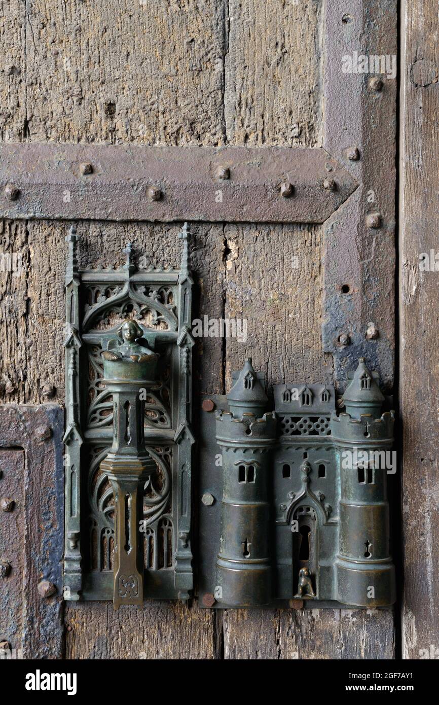 Door knocker and door lock on the gate of the town hall in Mons, province of Hainaut, Belgium Stock Photo
