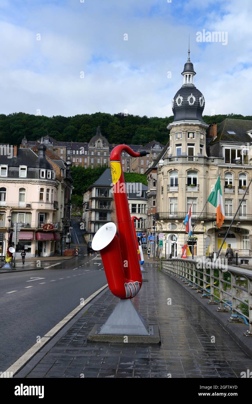 Colourful saxophone in memory of Adolphe Sax on the Pont du Charles de Gaulle, Dinant, Namur Province, Belgium Stock Photo
