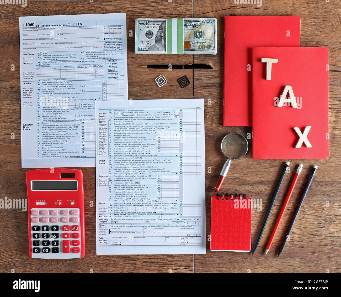 Individual tax return, form 1040 with calculator and notebook