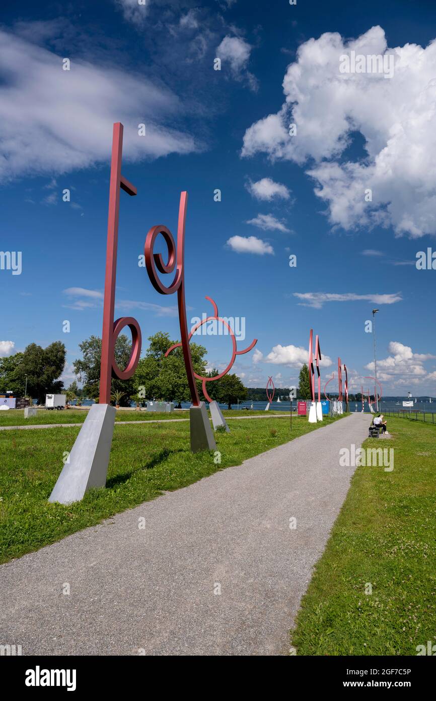 Border strip also called art border with individual sculptures between the German city of Constance and the Swiss city of Kreuzlingen, Canton Stock Photo
