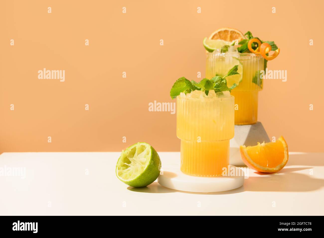 Classic cocktails, lemonade, mai tai, mojito with lime on modern still