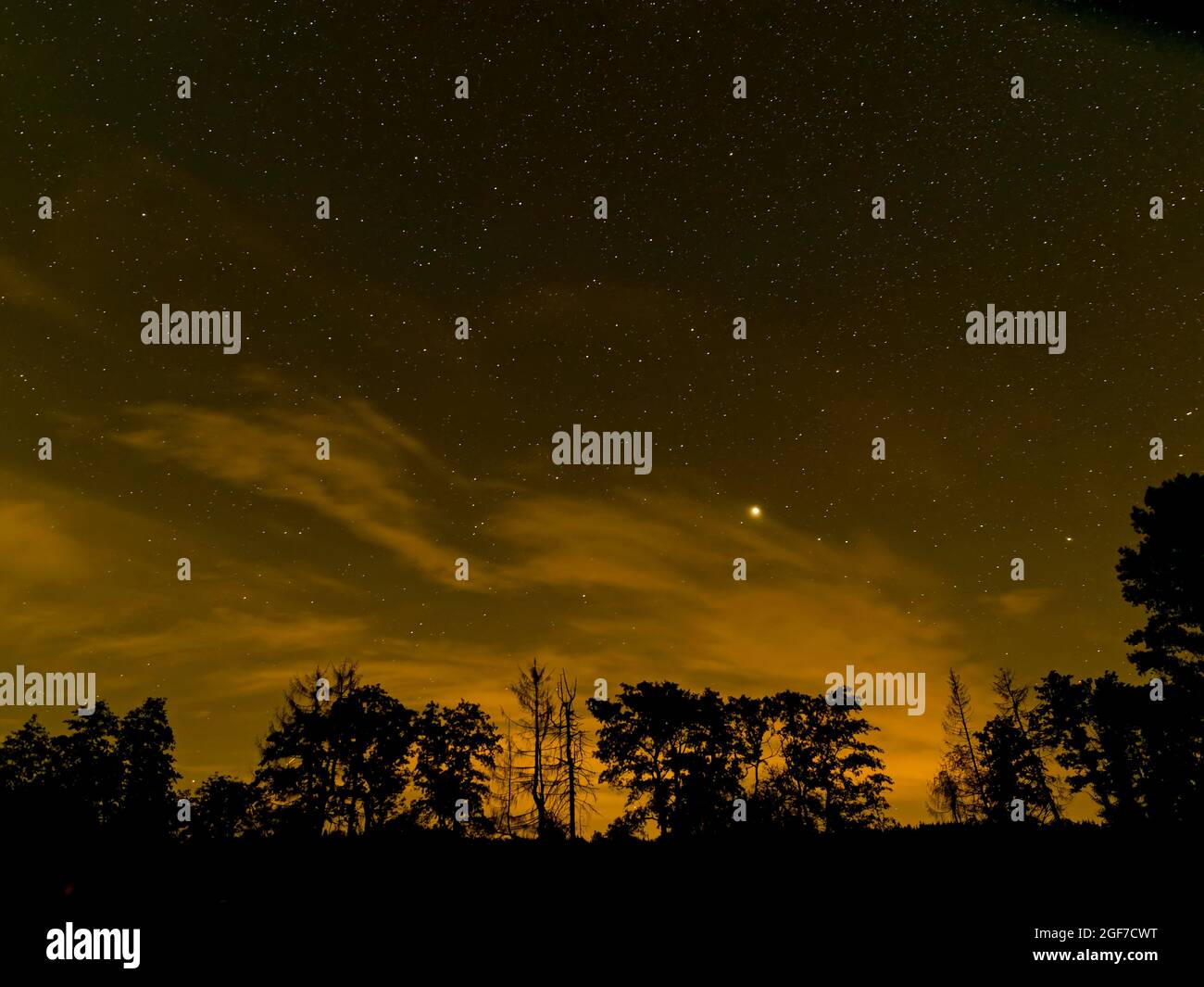 Starry sky with the planet Jupiter, Cirrostratus cloud, Westerwald, Hesse Stock Photo