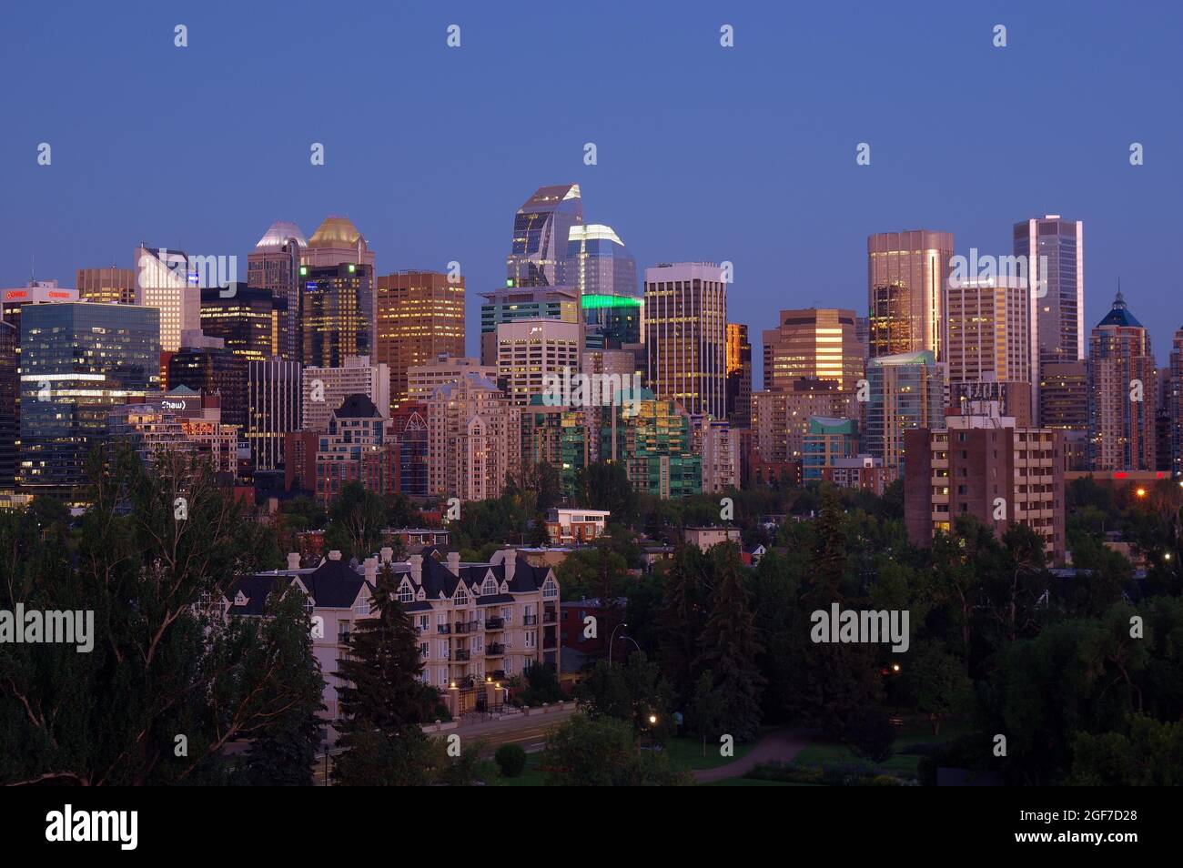 Skyline with skyscrapers at dusk, Calgary, Alberta, North America, Canada Stock Photo