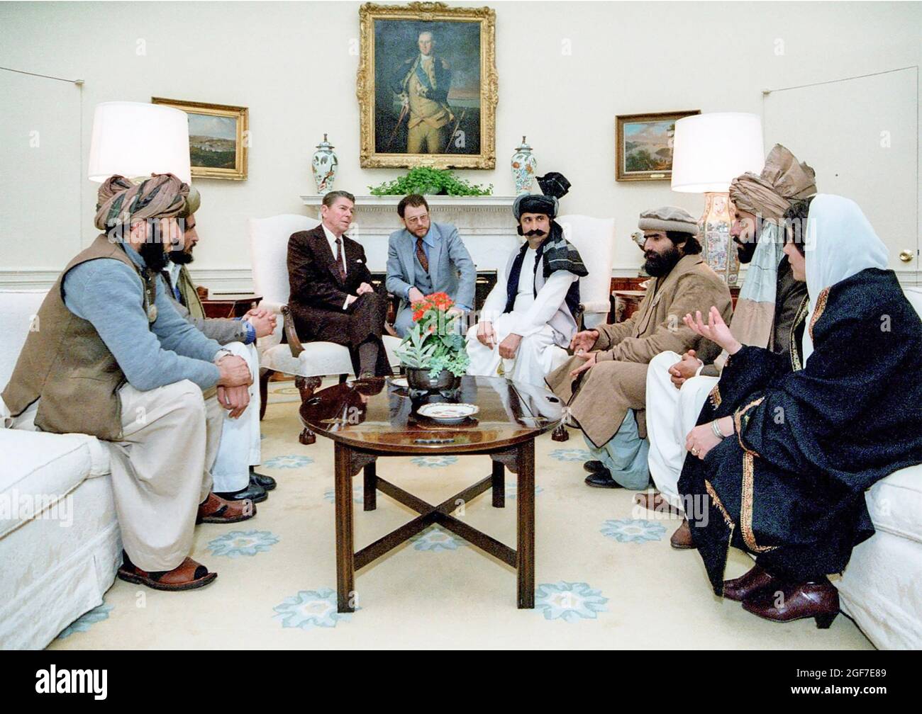 US PRESIDENT RONALD REAGAN meets with Afghan Mujahideen leaders in the Oval Office  on 2 February 1983. Photo: Michael Evans/White House Stock Photo