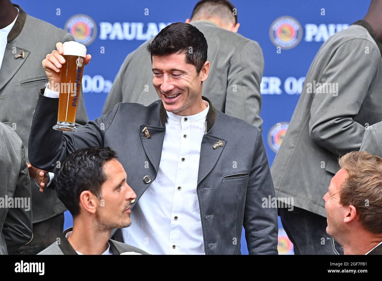 Munich, Germany. 23rd Aug, 2021. Robert Lewandowski raises a beer glass at  the FC Bayern München Paulaner "Lederhosen Shooting" at Paulaner am  Nockherberg. Credit: Lennart Preiss/dpa/Alamy Live News Stock Photo - Alamy