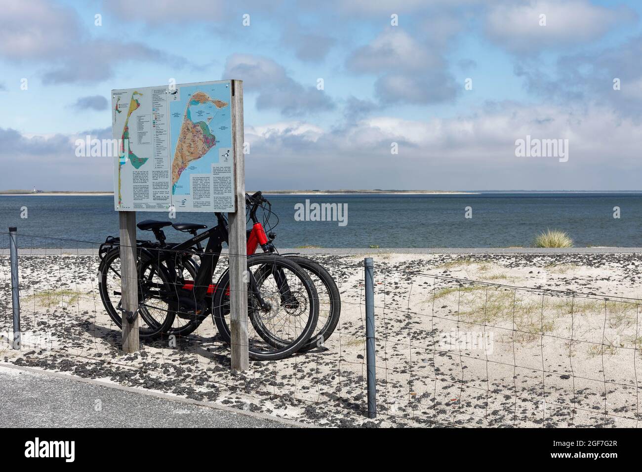 Bicycles parked at an information board on the Moevenberg dike, cycle