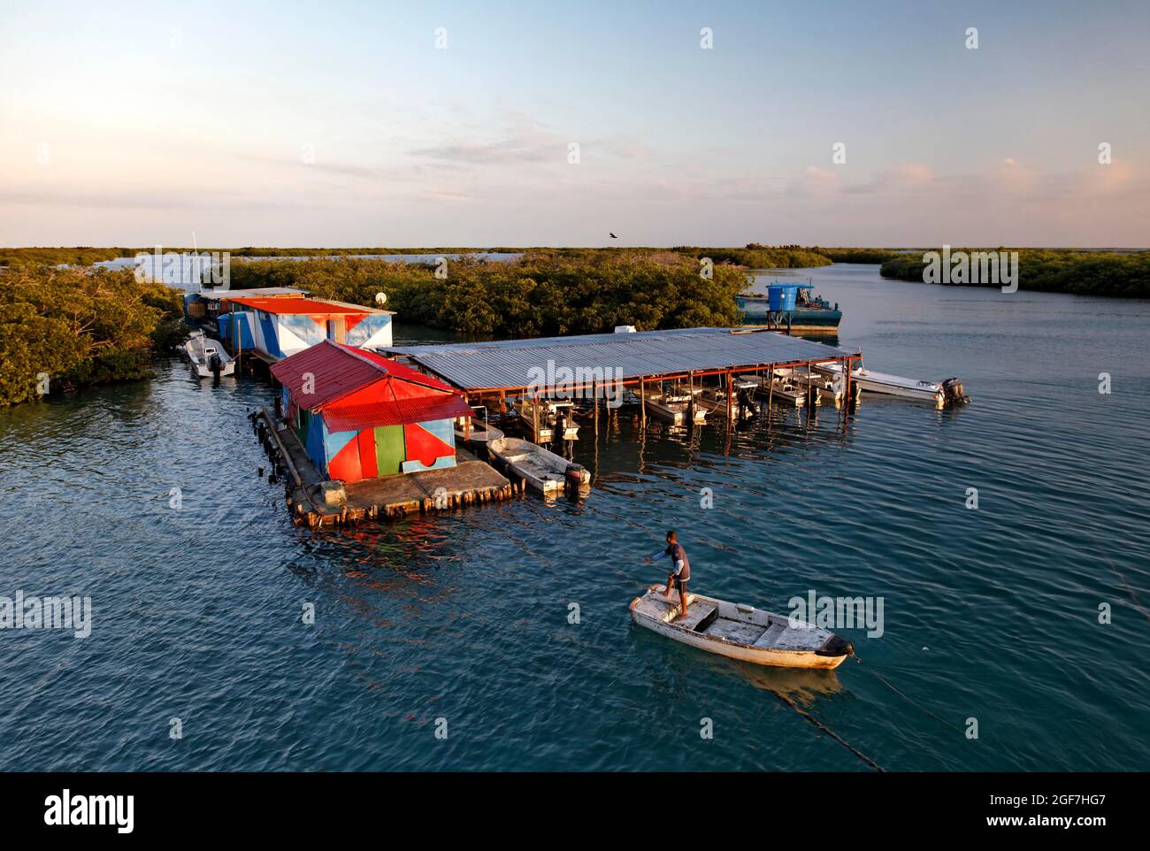 Dive centre with boats, back mangroves (Rhizophora), Jardines de la Reina National Park, Archipelago, Caribbean Sea, Camagueey and Ciego de Avila Stock Photo