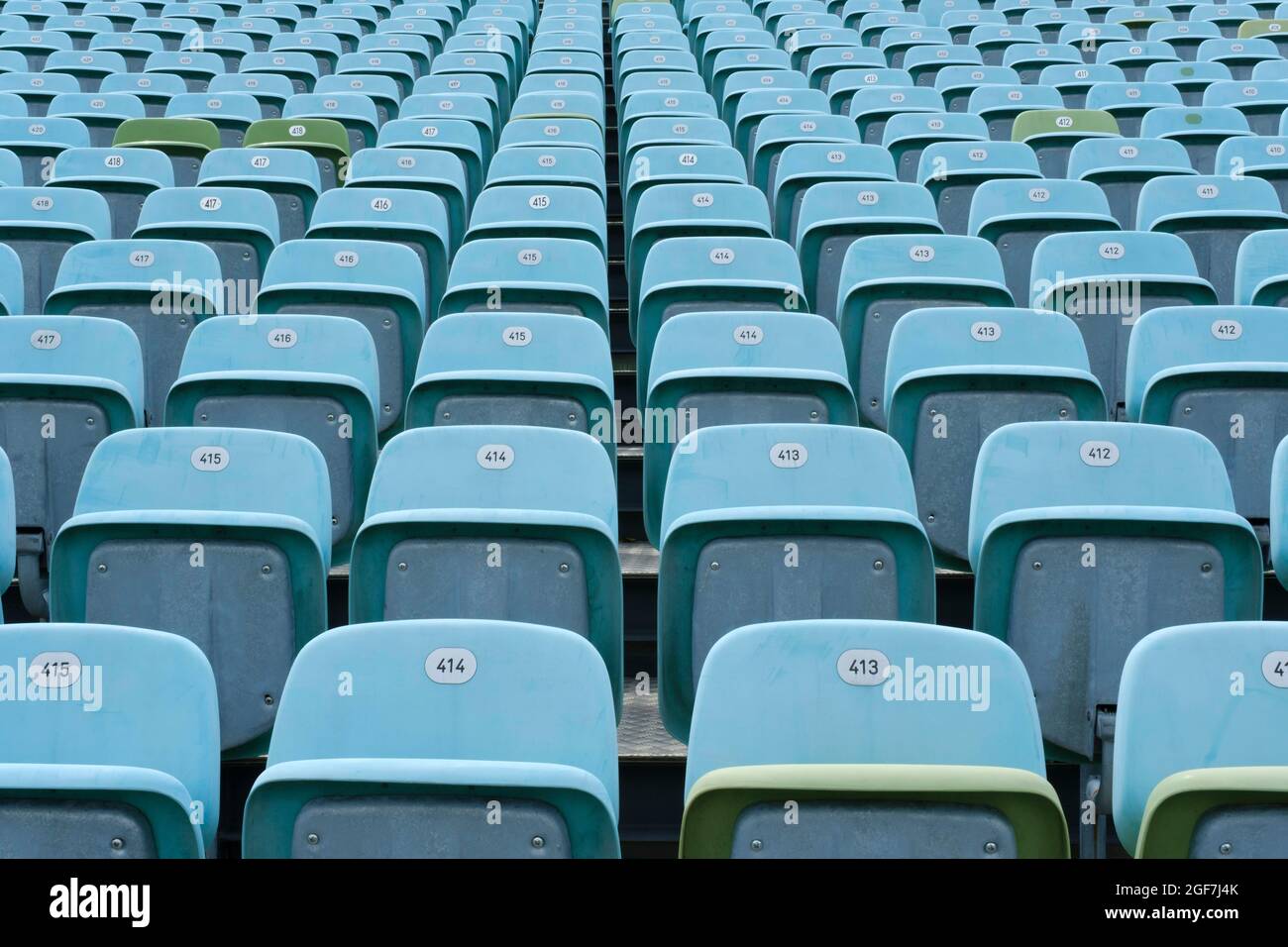 Blue and occasional green folding seats on the grandstand of the Seebuehne, Bregenz, Vorarlberg, Austria Stock Photo