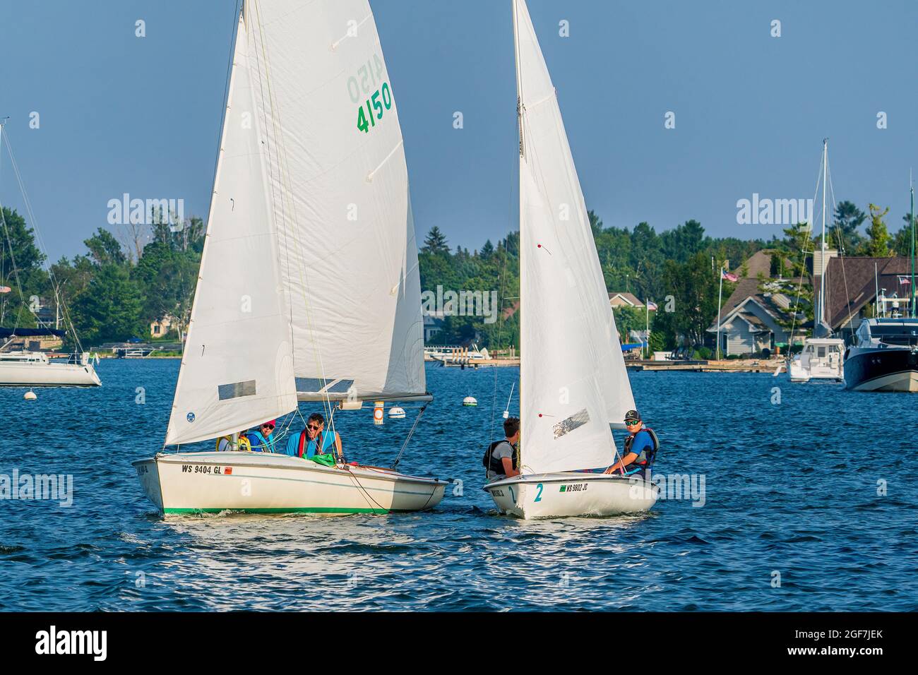 The Sturgeon Bay Yacht club holds sailboat races every Thursday night from May through October, in the channel between Lake Michigan and Green Bay. Stock Photo