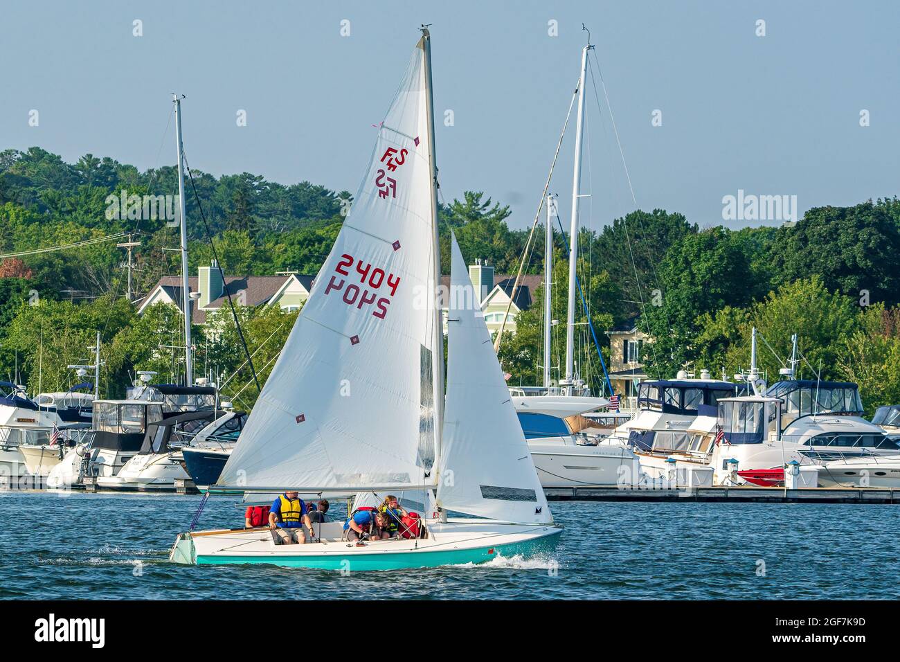 The Sturgeon Bay Yacht club holds sailboat races every Thursday night from May through October, in the channel between Lake Michigan and Green Bay. Stock Photo