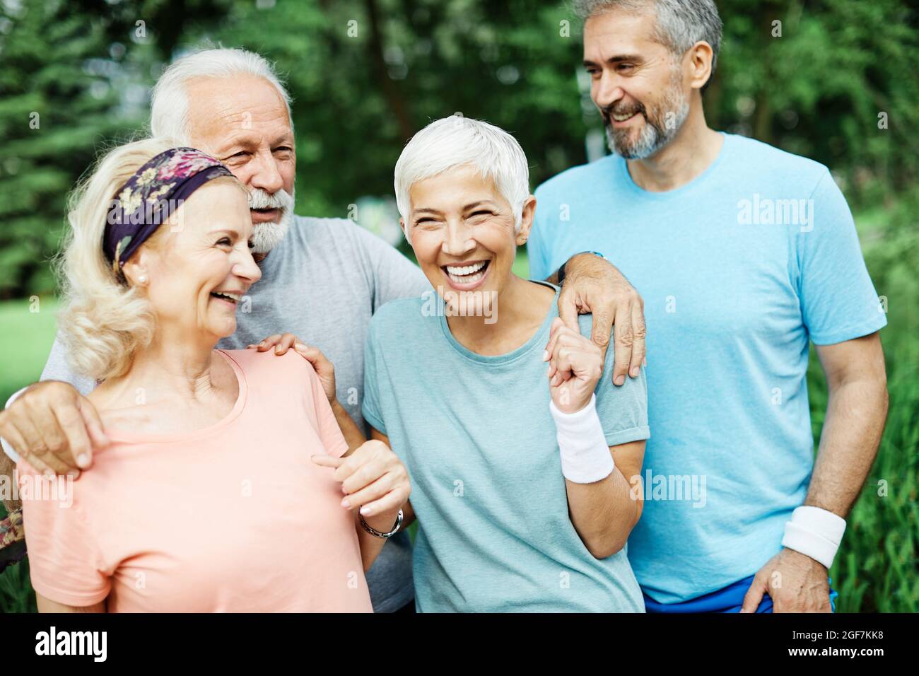 outdoor senior fitness woman man lifestyle active sport exercise healthy fit retirement Stock Photo