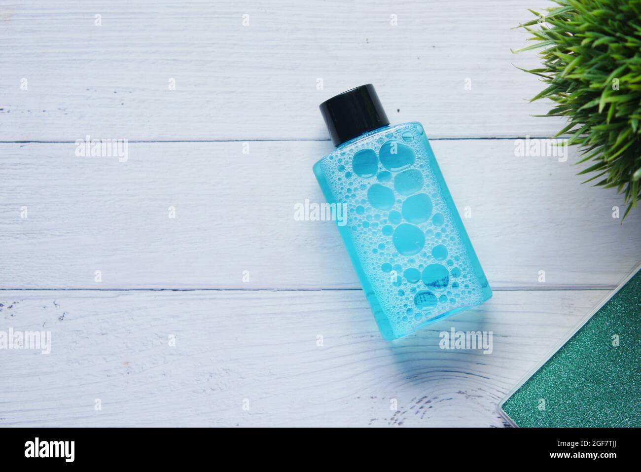 mouthwash liquid in a container on table Stock Photo Alamy
