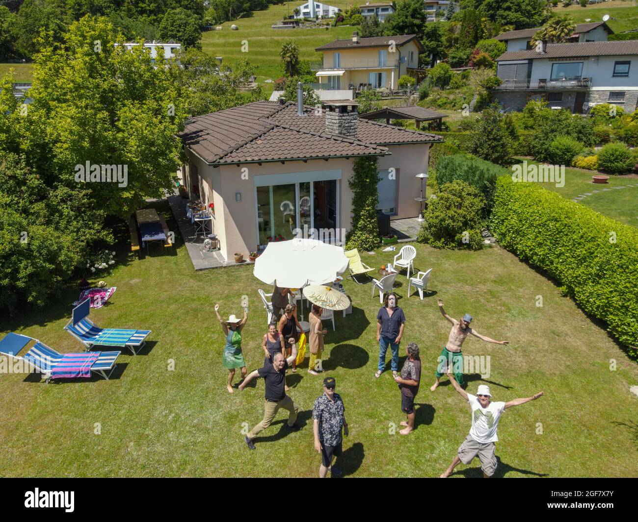 Arosio, Switzerland - 13 June 2021: people posing on a garden at Arosio in the italian part of Switzerland Stock Photo