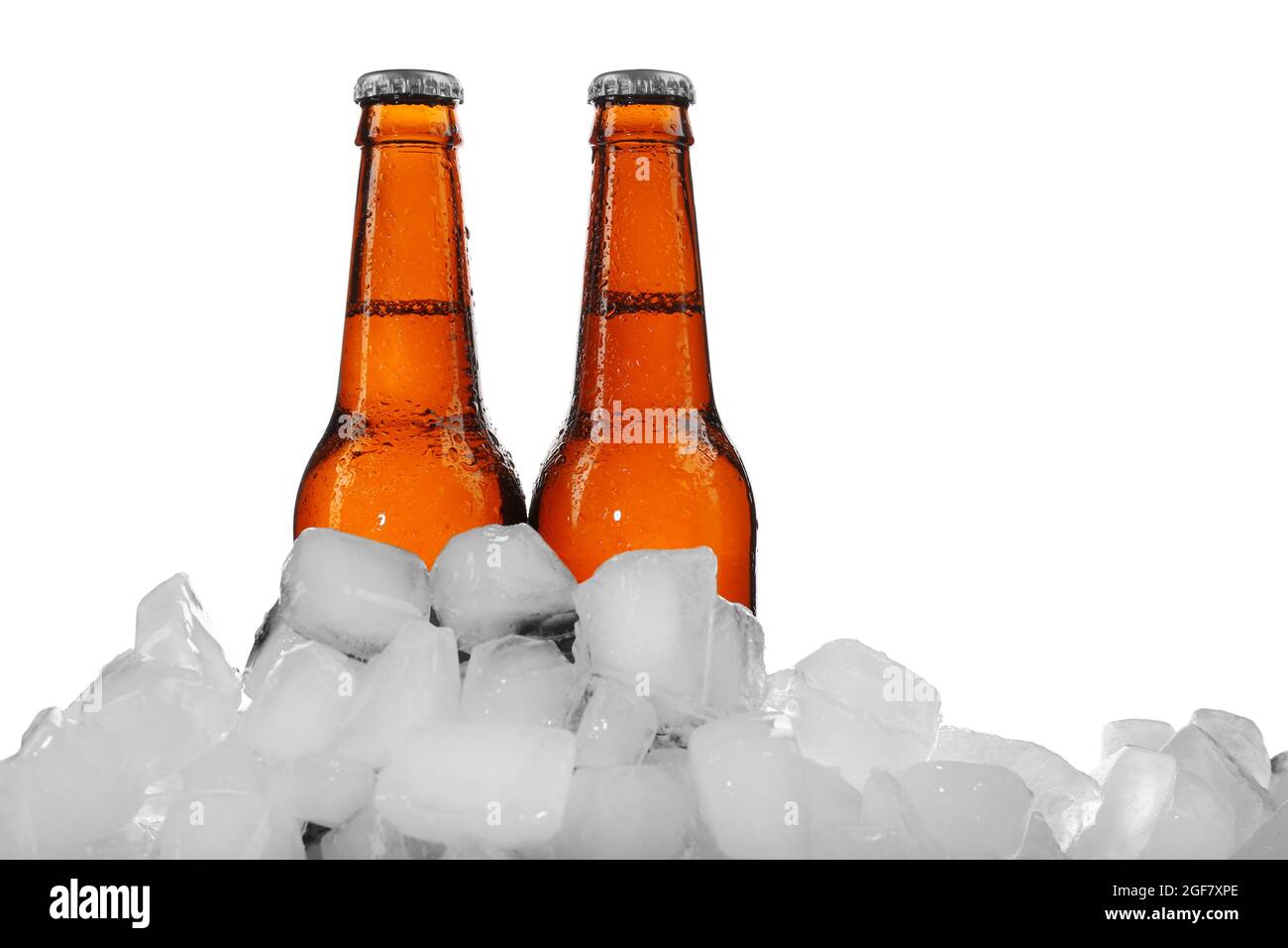 Beer bottles in ice cubes, isolated on white Stock Photo Alamy