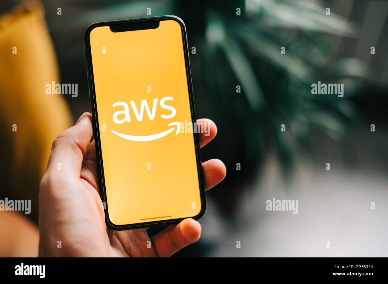 Amazon Web Services logo on the smartphone screen. Stock Photo