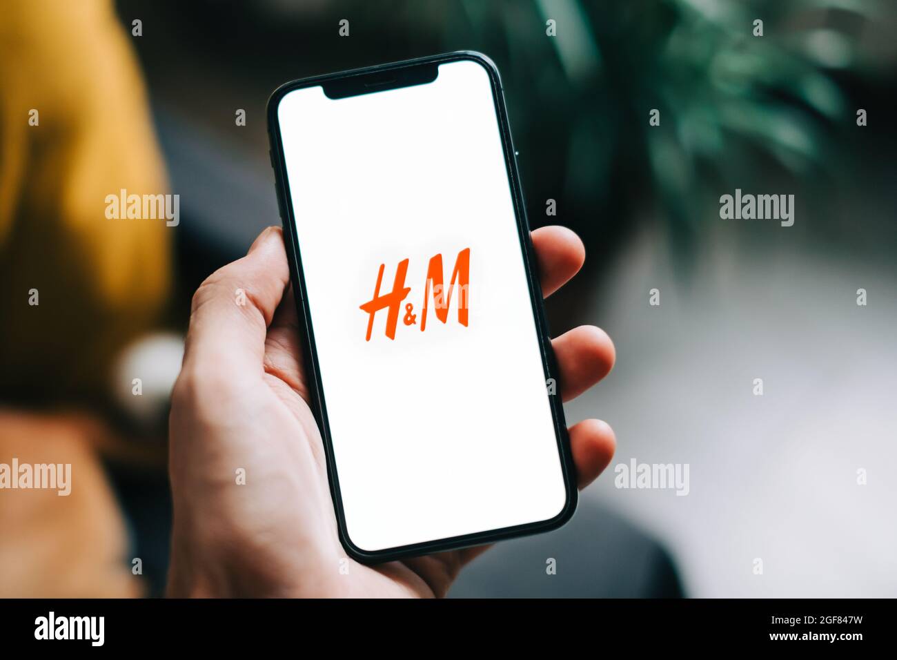 H&M logo on smartphone screen Stock Photo - Alamy