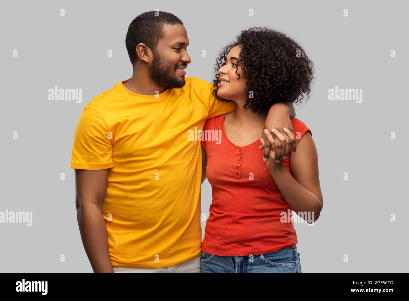 happy african american couple hugging Stock Photo