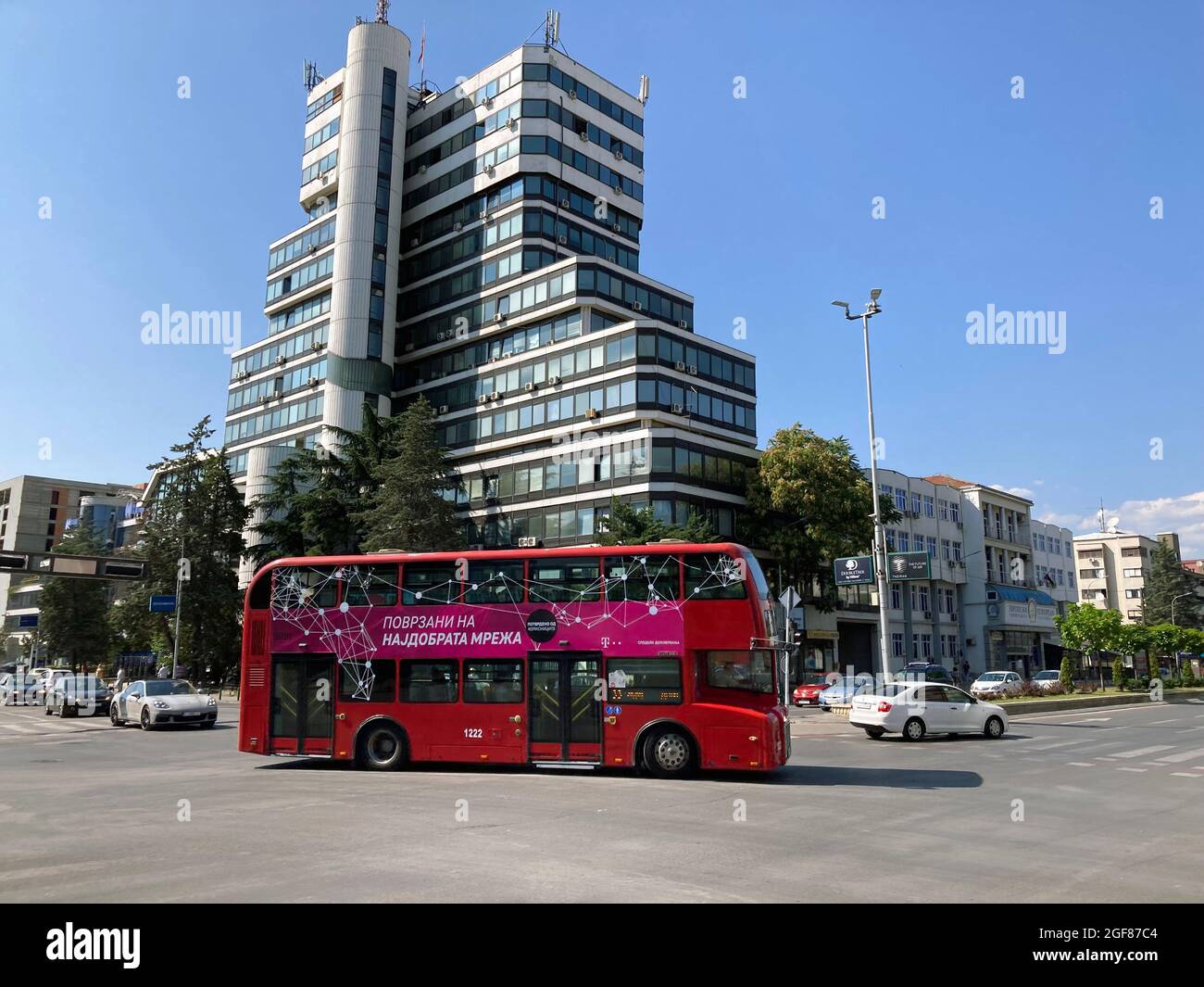 Macedonia, Skopje - August 20, 2021: red double-decker bus rides street in Skopje Stock Photo