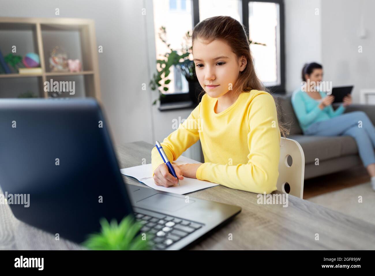 student girl with laptop learning online at home Stock Photo - Alamy
