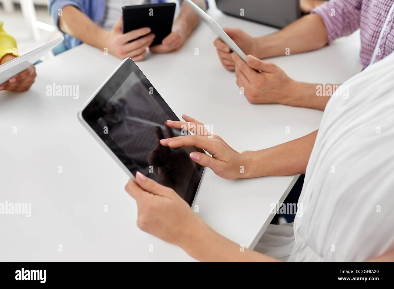 group of high school students with tablet pc Stock Photo - Alamy