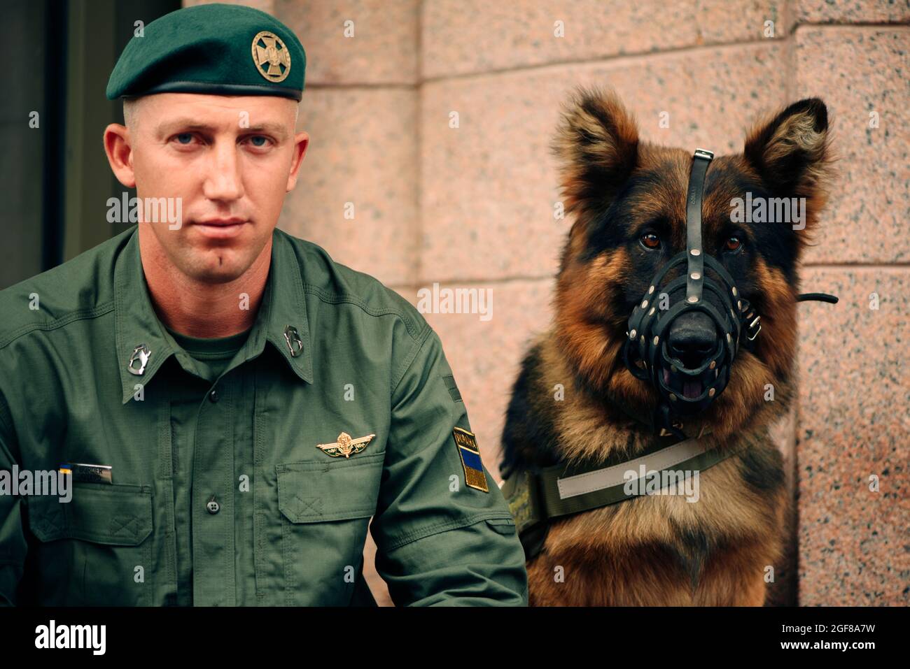 Kyiv, Ukraine - August 22, 2021: Rehearsal of the military parade of 30 years Independence Day of Ukraine. Military working dog handler and his dog Stock Photo